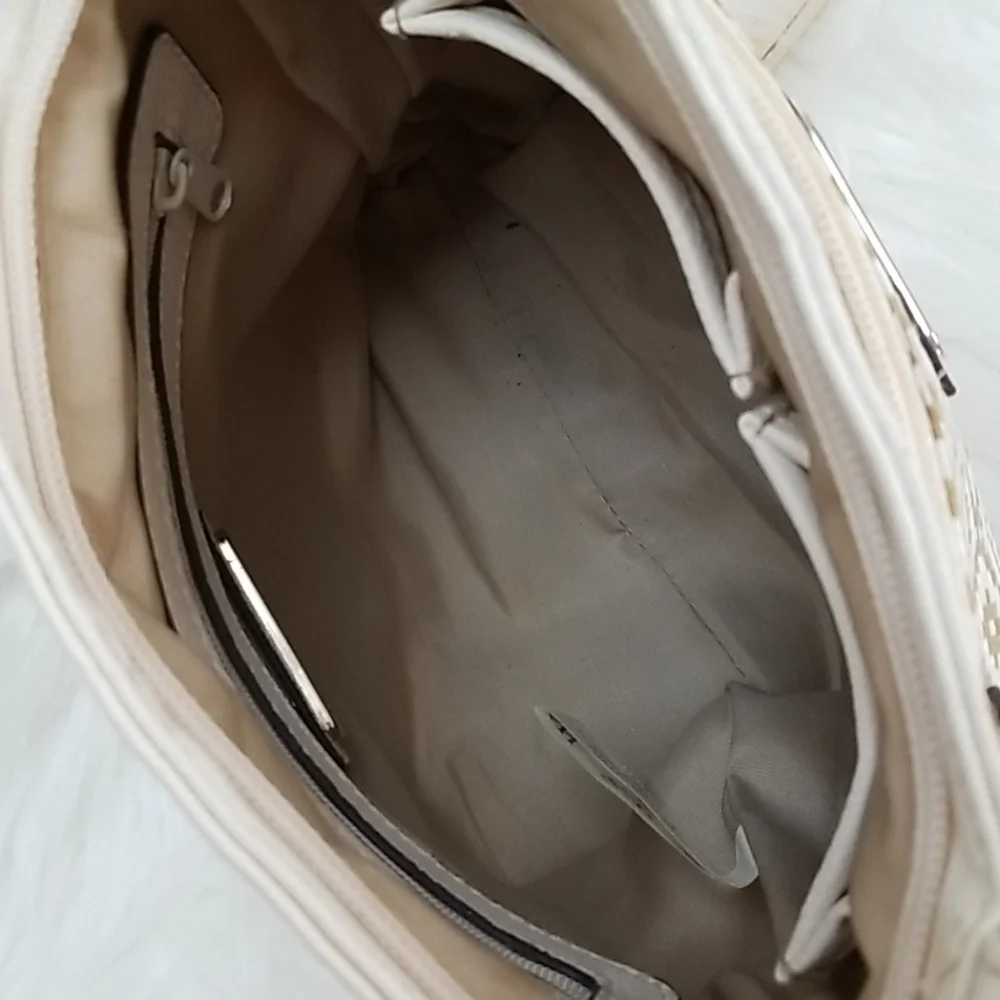 Rosetti white pebbled faux leather cross body bag